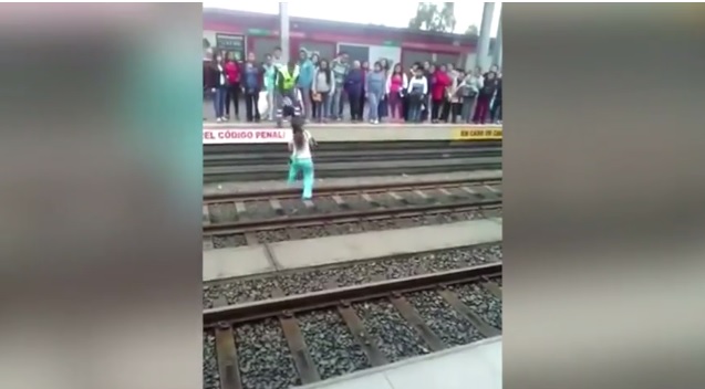 Woman in Peru Faces Possible Punishment for Saving a Dog from Train