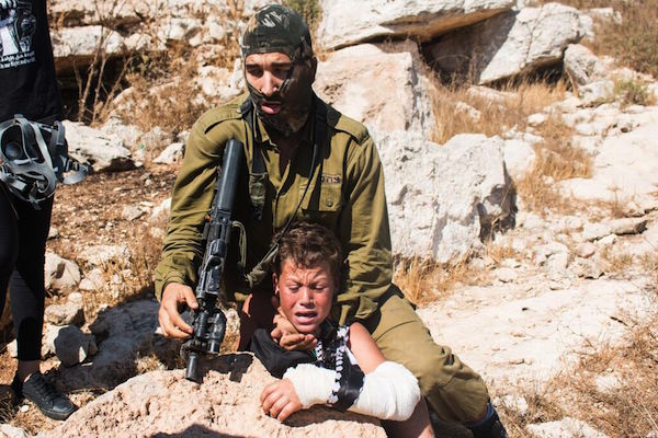 Video Showing Israeli Soldier Terrorizing Palestinian Child